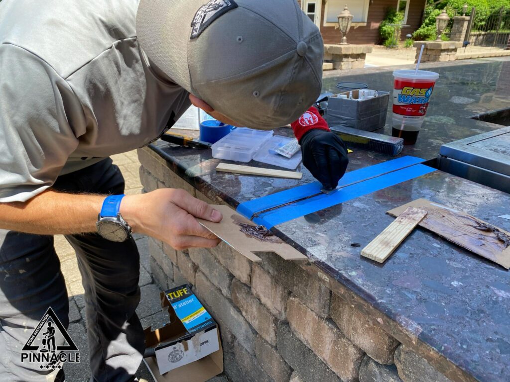 outdoor granite countertop repair, restoration, crack repair, seam leveling, seam repair, chip repair, granite cleaning, buffing, sealing